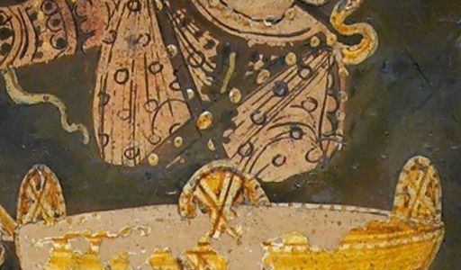 Pythia and tripod from a Greek vase. Wikimedia commons.